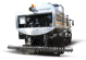 Camion avec répandeuse à bitume