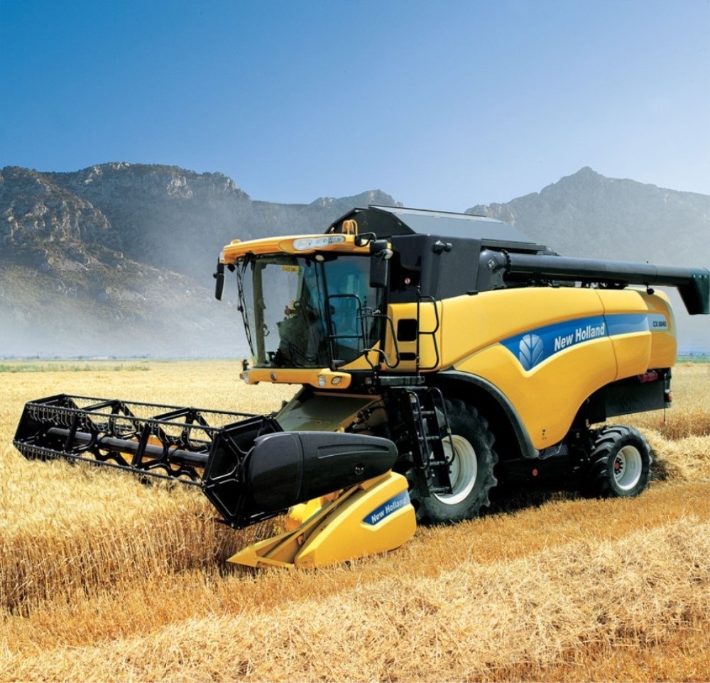 New holland цена. Зерноуборочный комбайн ниухоланд. Комбайн New Holland. Зерноуборочный комбайн Нью Холланд. Комбайн зерноуборочный (New Holland CR 9000).