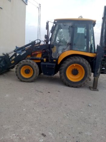 A vendre ou échanger tractopelle Cukurova 883 Bon état contre tracteur complet