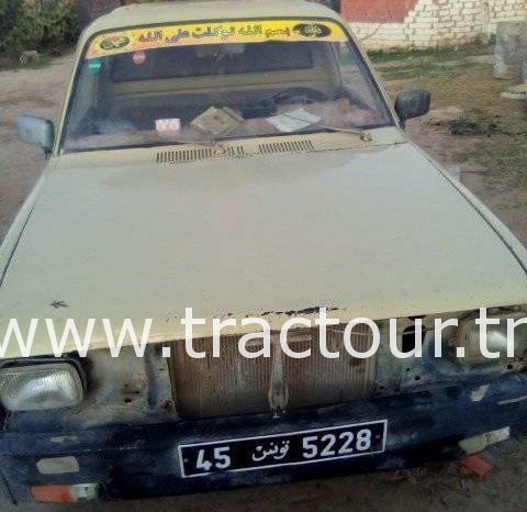 À vendre Camionnette 2 portes avec benne Isuzu KB 26 Bon état complet