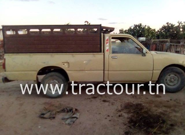 À vendre Camionnette 2 portes avec benne Isuzu KB 26 Bon état complet