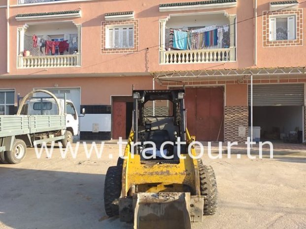 À vendre Chargeuse compacte avec godet Caterpillar 216 B3 Bon état complet