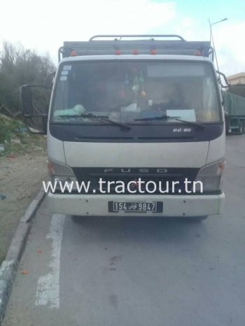 À vendre Camion plateau avec ridelles – complet