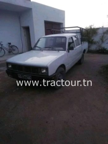 À vendre Camionnette 4 portes avec benne Isuzu KB 26 complet