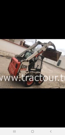 À vendre Chargeuse compacte avec godet Bobcat S130 Bon état complet