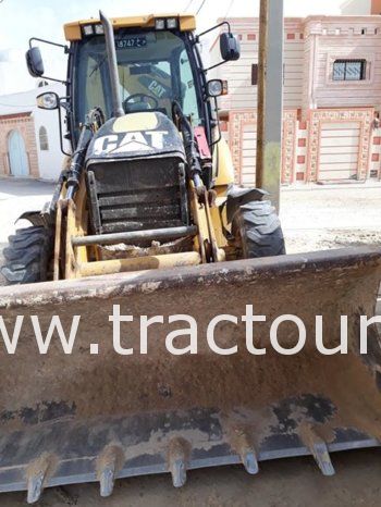 À vendre Tractopelle Caterpillar 428 E Neuf en excellent état complet