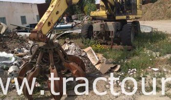 À vendre Pelle sur pneus avec grappin complet