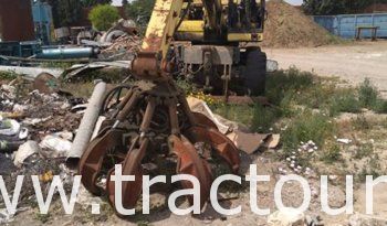 À vendre Pelle sur pneus avec grappin complet