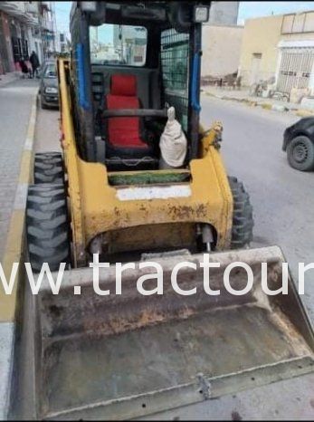 À vendre Chargeuse compacte avec godet Caterpillar 216 B3 complet