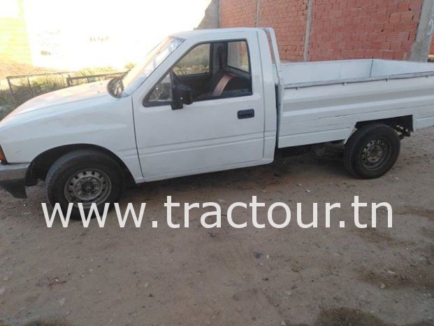 À vendre Camionnette 2 portes avec benne Isuzu Faster 2.5D complet