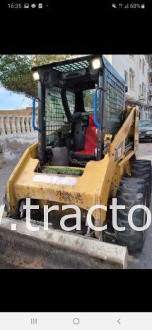 À vendre Chargeuse compacte avec godet Caterpillar 216 B3 ou à échanger contre tractopelle complet
