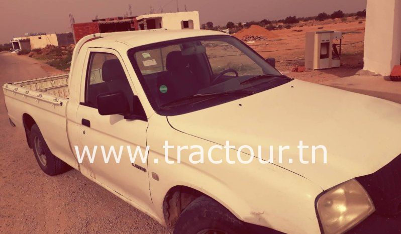 À vendre Camionnette 2 portes avec benne Mitsubishi L200 complet