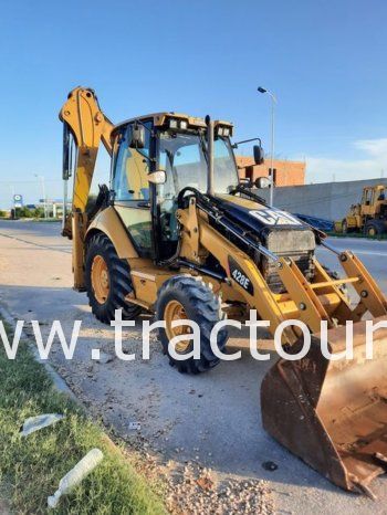 À vendre Tractopelle Caterpillar 428 E avec 4 pneus neufs complet