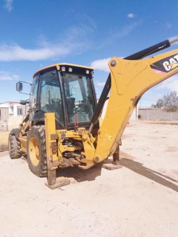 À vendre Tractopelle Caterpillar 428E complet