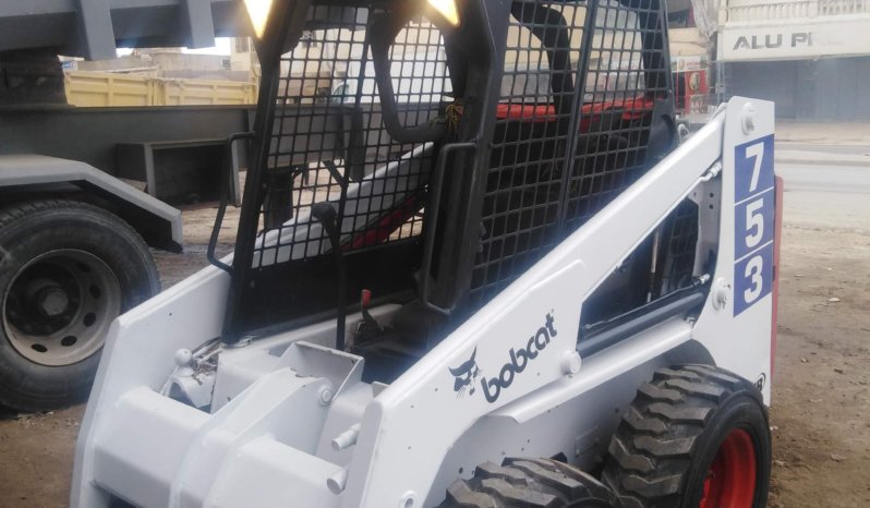 À vendre Chargeuse compacte avec godet Bobcat 753 complet