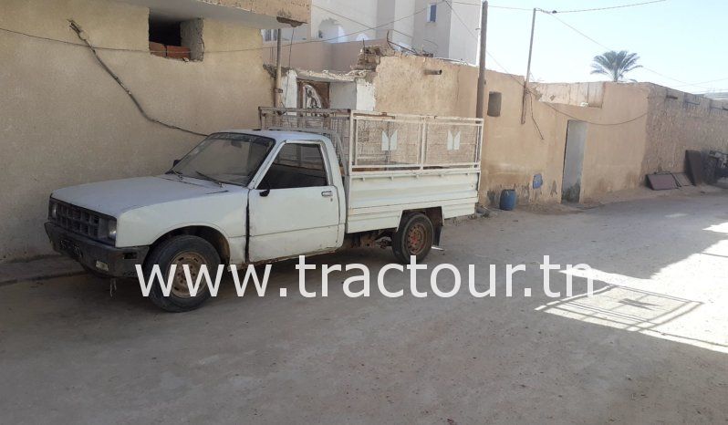 À vendre Camionnette 2 portes avec benne Isuzu KB 26 complet