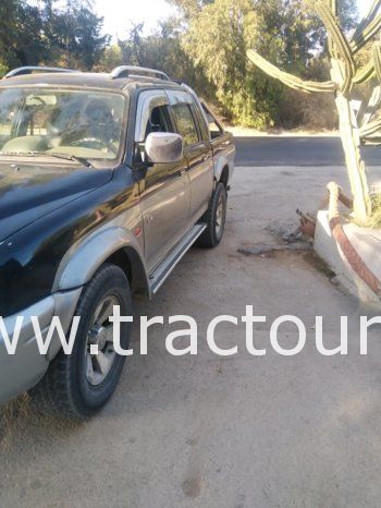 À vendre Pick-up 4×4 avec benne Mitsubishi L200 (2005) complet