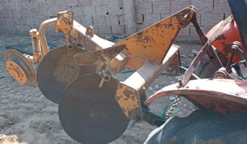 À vendre Tracteur Kubota L245DT avec carte grise et charrue à 2 disques Huard complet