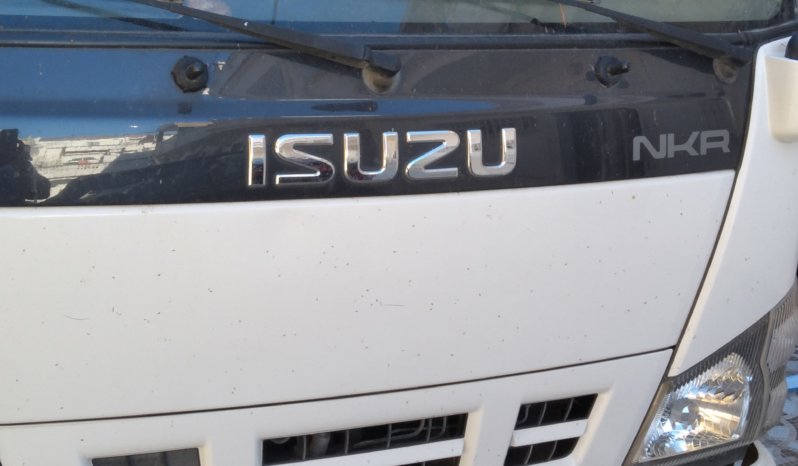 A vendre camion plateau avec ridelles Isuzu NKR (2015) complet