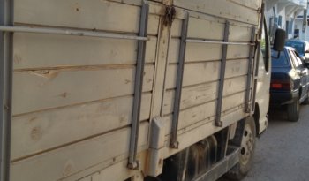 A vendre camion plateau avec ridelles Isuzu NKR (2015) complet
