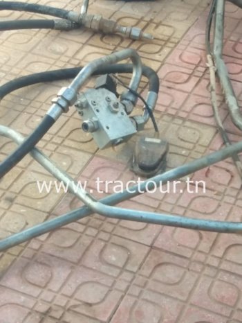À vendre installation Brise-roche hydraulique pour tractopelle complet