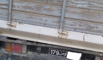A vendre camion plateau avec ridelles Isuzu NKR (2015) complet