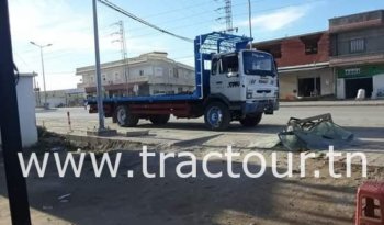 À vendre Camion plateau sans ridelles Renault 230 complet