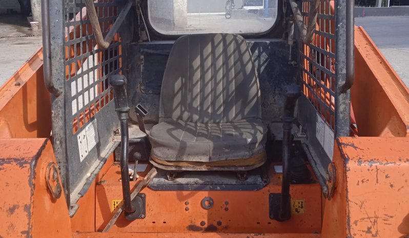 À vendre Chargeuse compacte avec godet Daewoo DSL802 complet