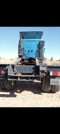 À vendre Tracteur Scania 113H 360  avec semi remorque plateau avec ridelles Comet (1993) complet