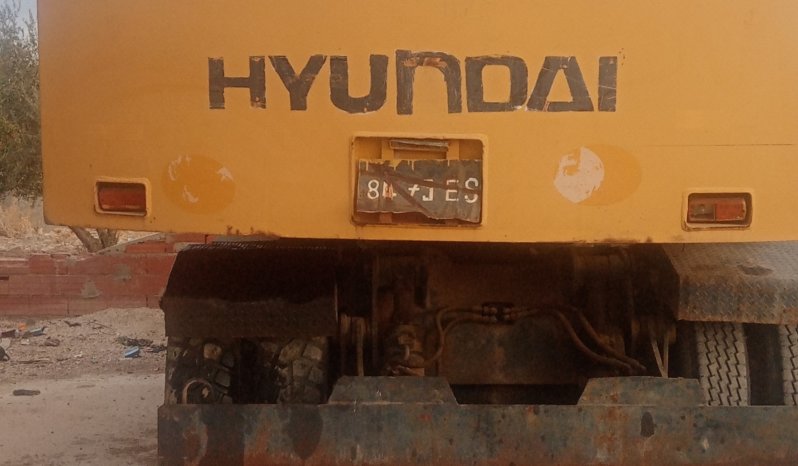 À vendre Pelle sur pneus avec godet Hyundai Robex 200 avec carte grise complet