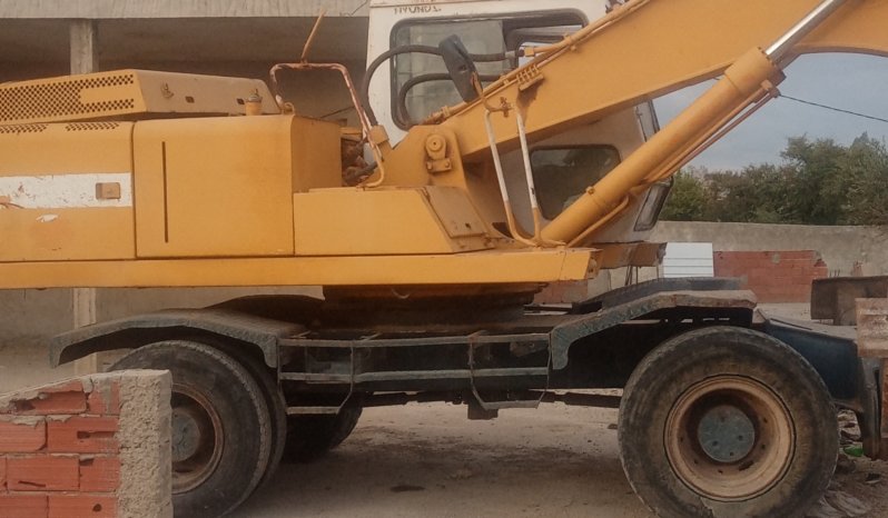 À vendre Pelle sur pneus avec godet Hyundai Robex 200 avec carte grise complet