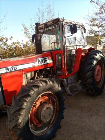 À vendre Tracteur avec cabine Massey Ferguson 595  (1988) complet