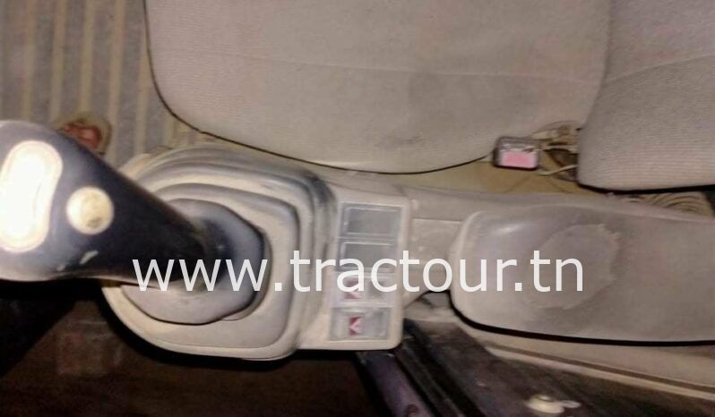 À vendre Pelle sur pneus avec brise roche Case complet