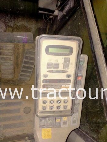 À vendre Pelle sur pneus avec brise roche Case complet