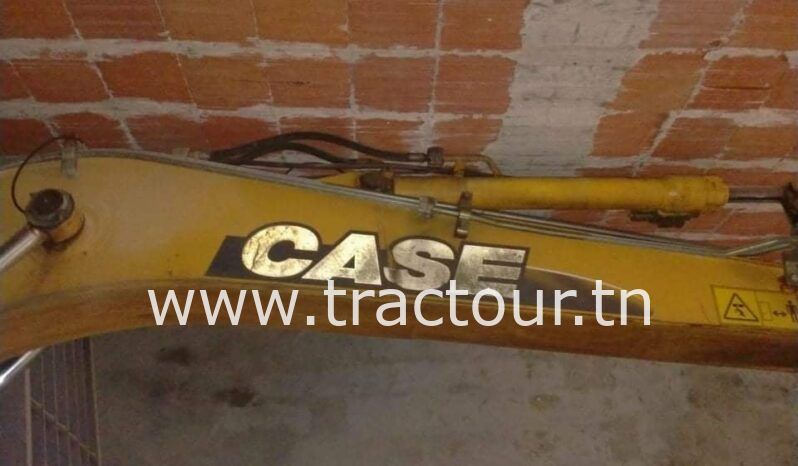 À vendre Pelle sur pneus avec brise roche Case complet