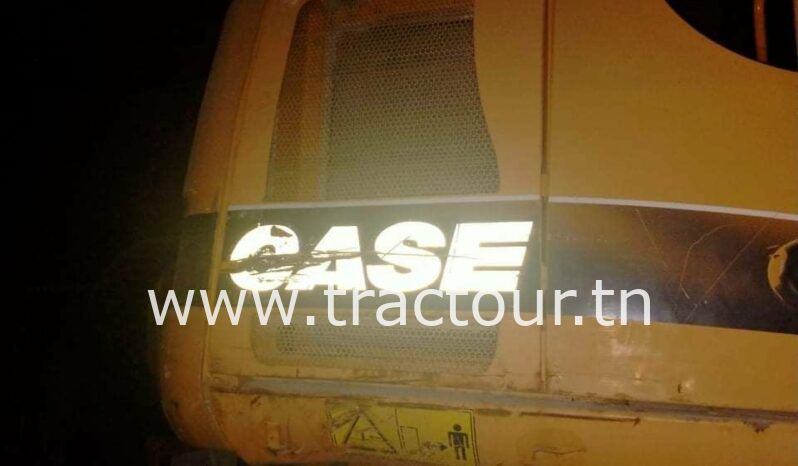 À vendre Pelle sur pneus avec brise roche Case complet