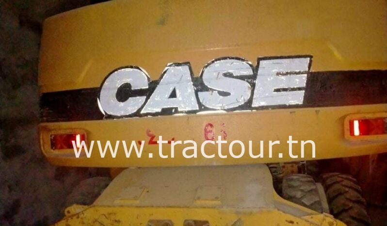 À vendre Pelle sur pneus avec brise roche Case complet