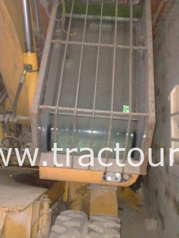 À vendre Pelle sur pneus avec brise roche Case complet