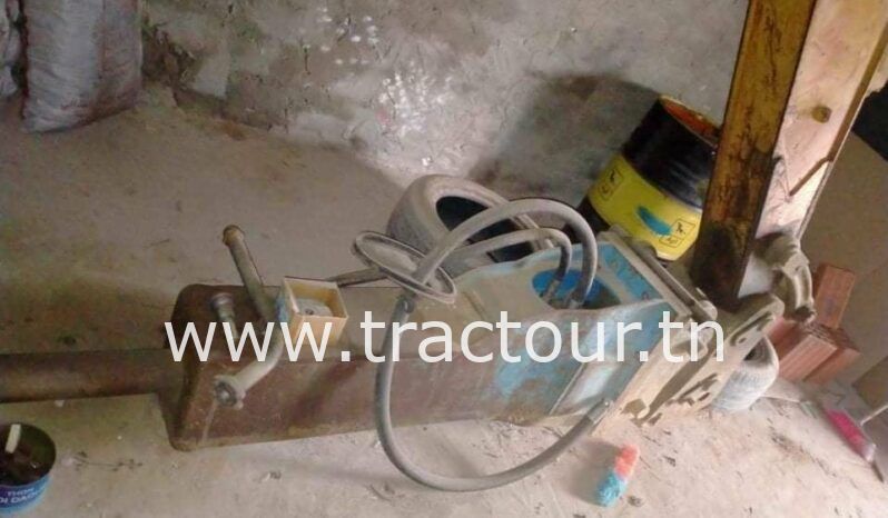 À vendre Pelle sur pneus avec brise roche Case complet