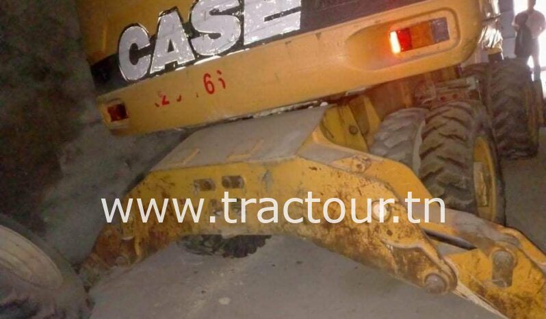 À vendre Pelle sur pneus avec brise roche Case complet