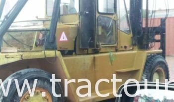 À vendre Chariot élévateur diesel Caterpillar moteur V8 avec multifonctions fourchette et spreader complet