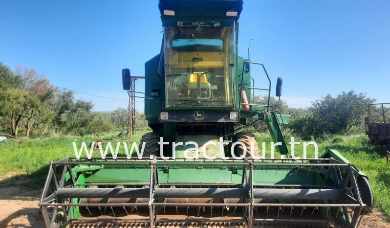 À vendre Moissonneuse batteuse à trémie et vis John Deere 1055 complet