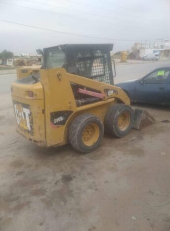 À vendre Chargeuse compacte avec godet Caterpillar 216 B3 complet