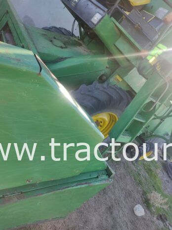 À vendre Moissonneuse batteuse à sacs بالشكارة John Deere 1157 complet