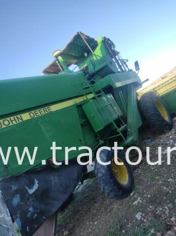 À vendre Moissonneuse batteuse à sacs بالشكارة John Deere 1157 complet