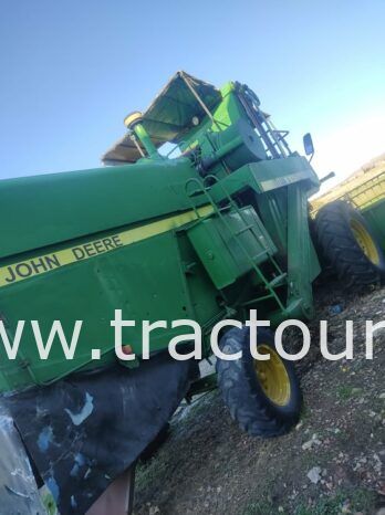 À vendre Moissonneuse batteuse à sacs بالشكارة John Deere 1157 complet
