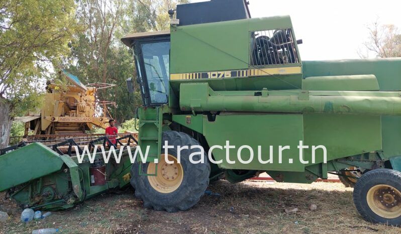 À vendre Moissonneuse batteuse à trémie et vis John Deere 1075 complet