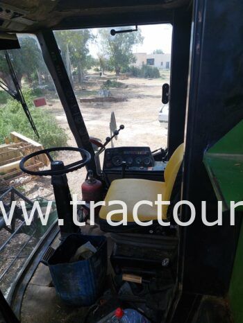 À vendre Moissonneuse batteuse à trémie et vis John Deere 1075 complet