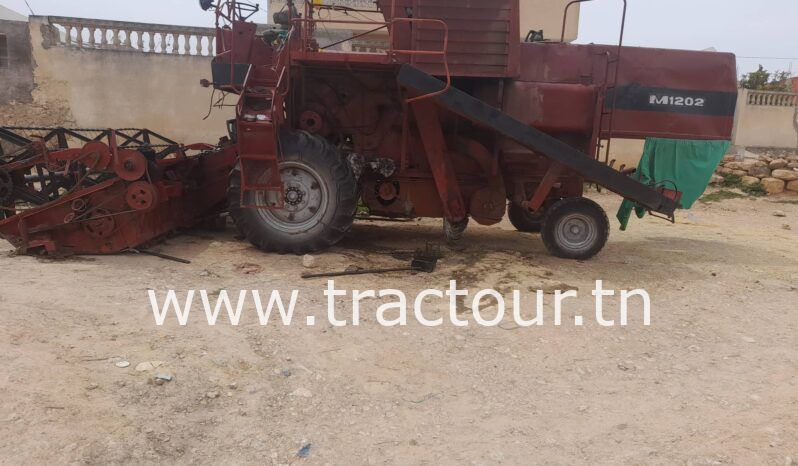 À vendre Moissonneuse batteuse à sacs بالشكارة Deutz-Fahr M1202 complet