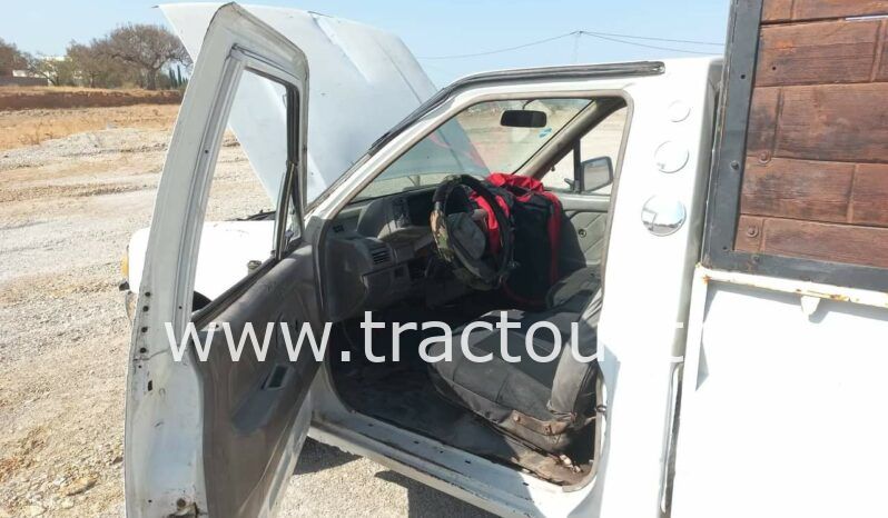 À vendre Camionnette 2 portes avec benne Isuzu complet